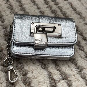 Silver Juicy Couture wristlet wallet.